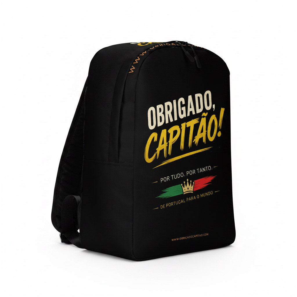 A black backpack featuring a Portuguese graphic print that reads 'OBRIGADO, CAPITÃO!' in white and yellow, with a green and red paint stroke design and a gold crown below, shown on a plain white background.